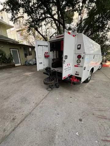 Magnet Plumbing service vehicle on-site for Sewer Line Repair in Fairpark